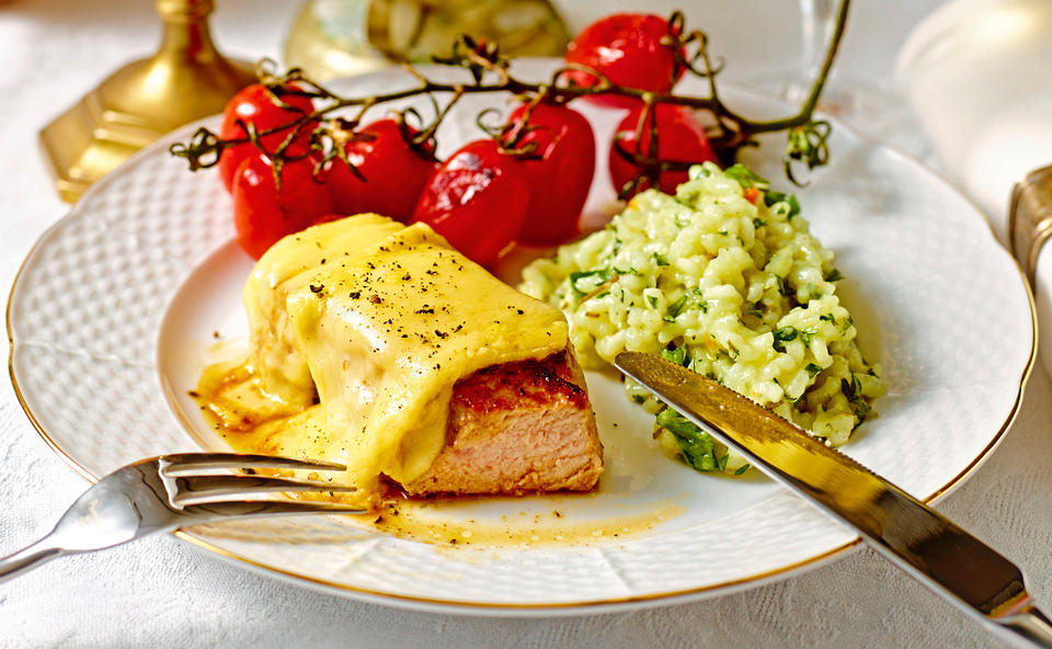 Kalbssteaks mit Raclettekäse und Kräuterrisotto