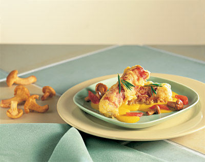 Putenstreifen mit Eier-schwammerln und Currysauce