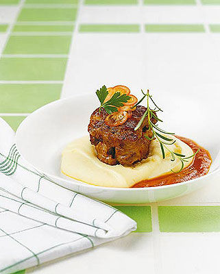 Mit Tomaten geschmorter Ochsenschlepp