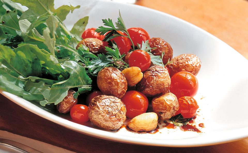 Heurige mit Tomaten und Rucola