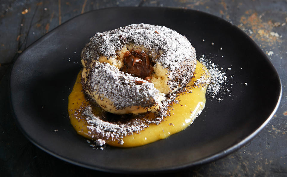 Mohnknödel mit Nougat und Orangensauce